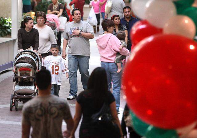 Nov. 27, 2009: Black Friday shoppers line the walkways of Ridgmar Mall in Fort Worth.