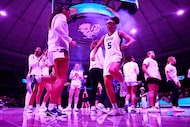 Texas Christian University Horned Frogs guard Olivia Miles (5) and teammate Natalie Mazurek...