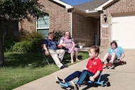 Samuel Owens, left, Abigail Owens, 6-year-old Oren Owens, and 10-year-old Micah Owens play...