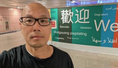 Petey Feng standing in the airport in Taipei