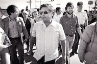 In this undated photo, Cesar Chavez marches with farm workers in San Juan, Texas.