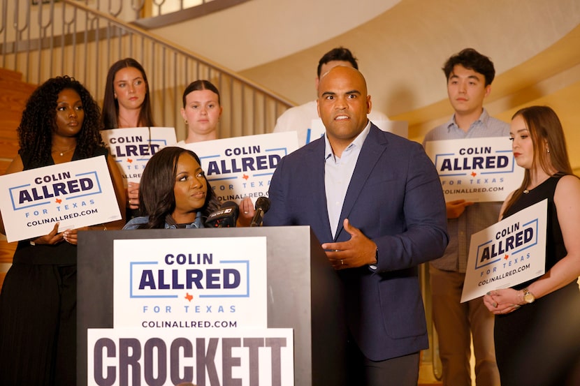 Former U.S. Rep. Colin Allred speaks during a news conference as U.S. Rep. Jasmine...