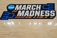 The March Madness logo adorns the court during the second half of a game between South...