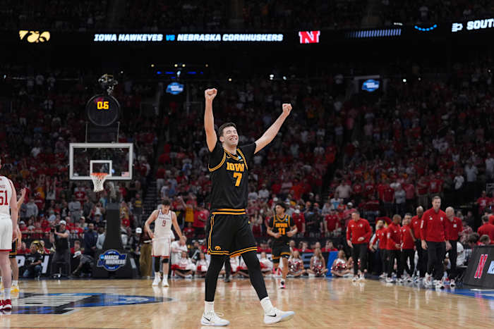 Ninth-seeded Iowa continues improbable March run, beating Nebraska 77-71 to reach Sweet 16