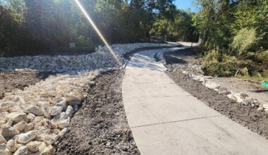 Photo of freshly poured paved sidewalk and bordering landscaping at Ridgeline Nighborhood Park