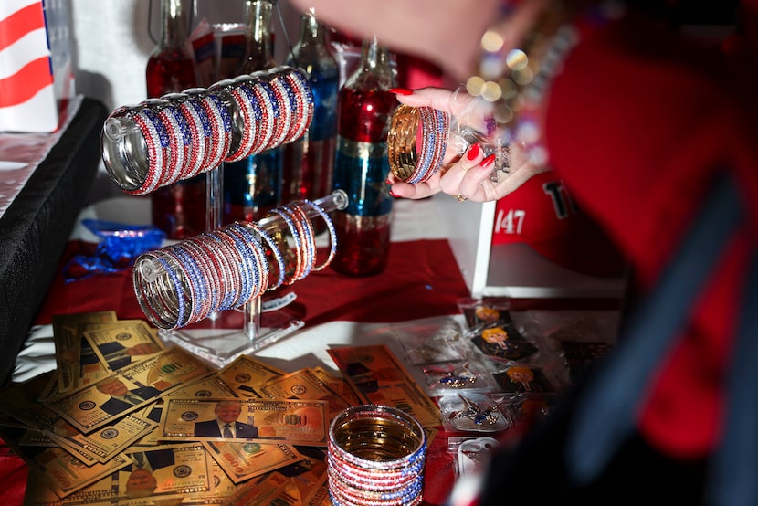 People buy merchandise during the Conservative Political Action Conference, on Friday, March...