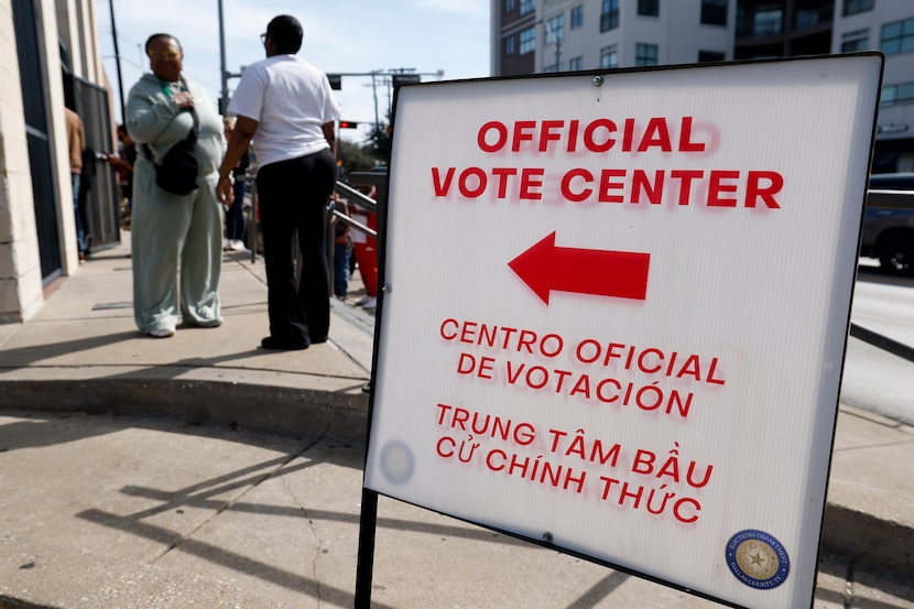 An official vote center sign is seen at Oak Lawn Branch Library on the first day of early...