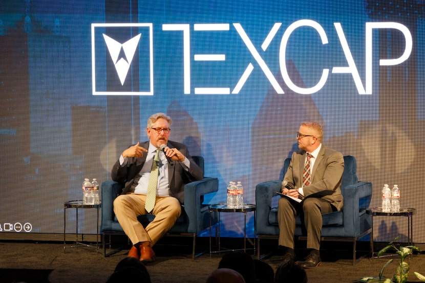 Bryan Daniel, president of NYSE Texas, left, speaks as moderator Eric F. Hinton, director of...