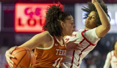 Texas forward Justice Carlton (11) fights for position during the first half of an NCAA college basketball game against Georgia, Monday, Feb. 24, 2025, in Athens, Ga. (AP Photo/Erik Rank)