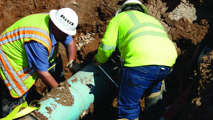 Austin Water pipeline technicians excavate a worksite.