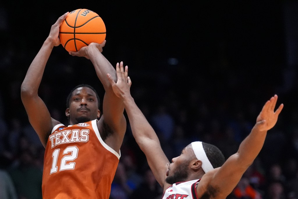 Tramon Mark hits a fadeaway jumper from just inside the 3-point line with 1.1 seconds left to lead Texas to a 68-66 win over N.C. State in a First Four matchup on March 17, 2026.