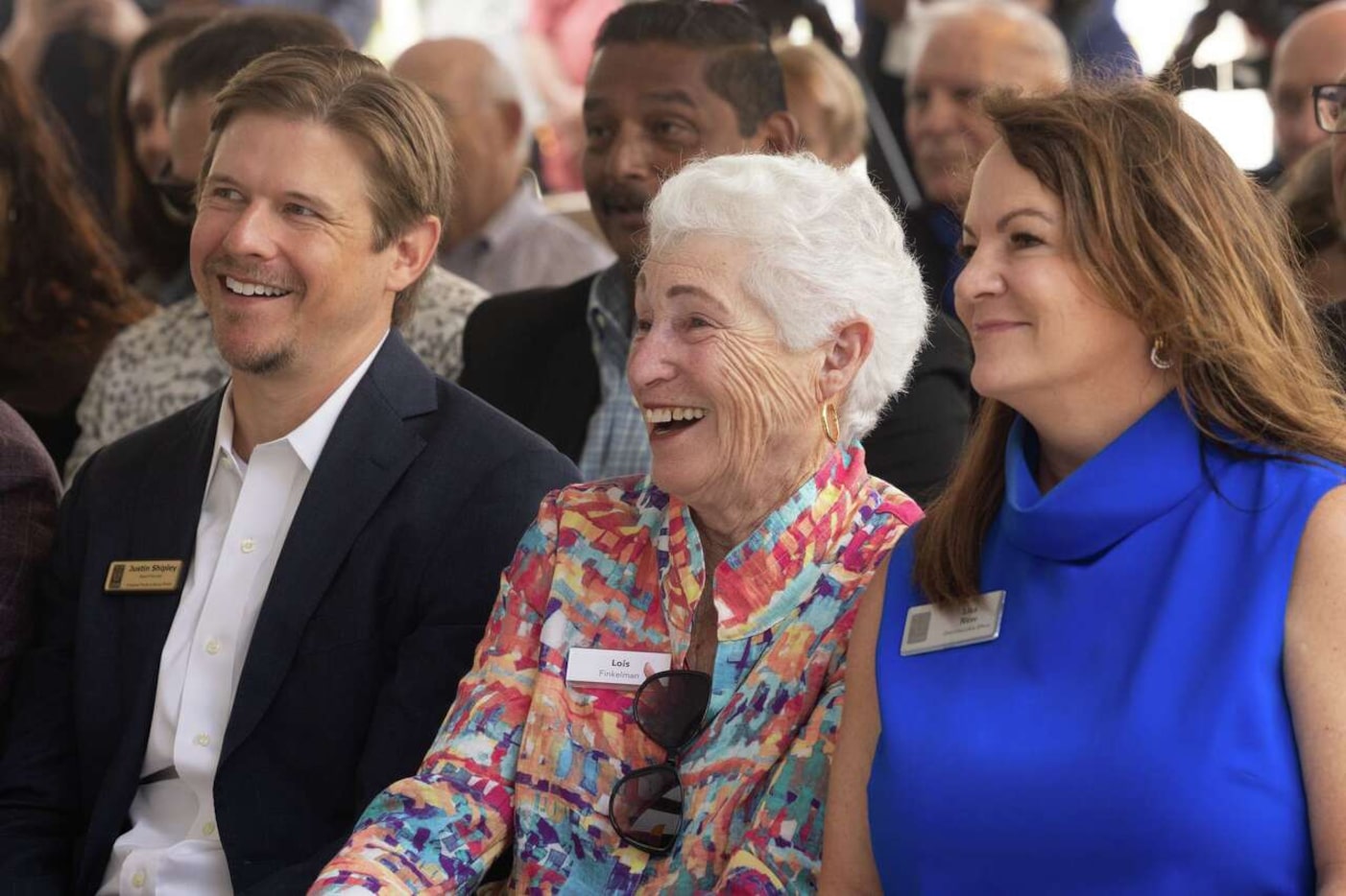 Former Council member Lois Finkelman (center) reacts after being mentioned as the Dallas Zoo...