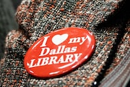 An audience member wears a button that reads, “I ♥︎ my Dallas LIBRARY”, as Dallas Public...