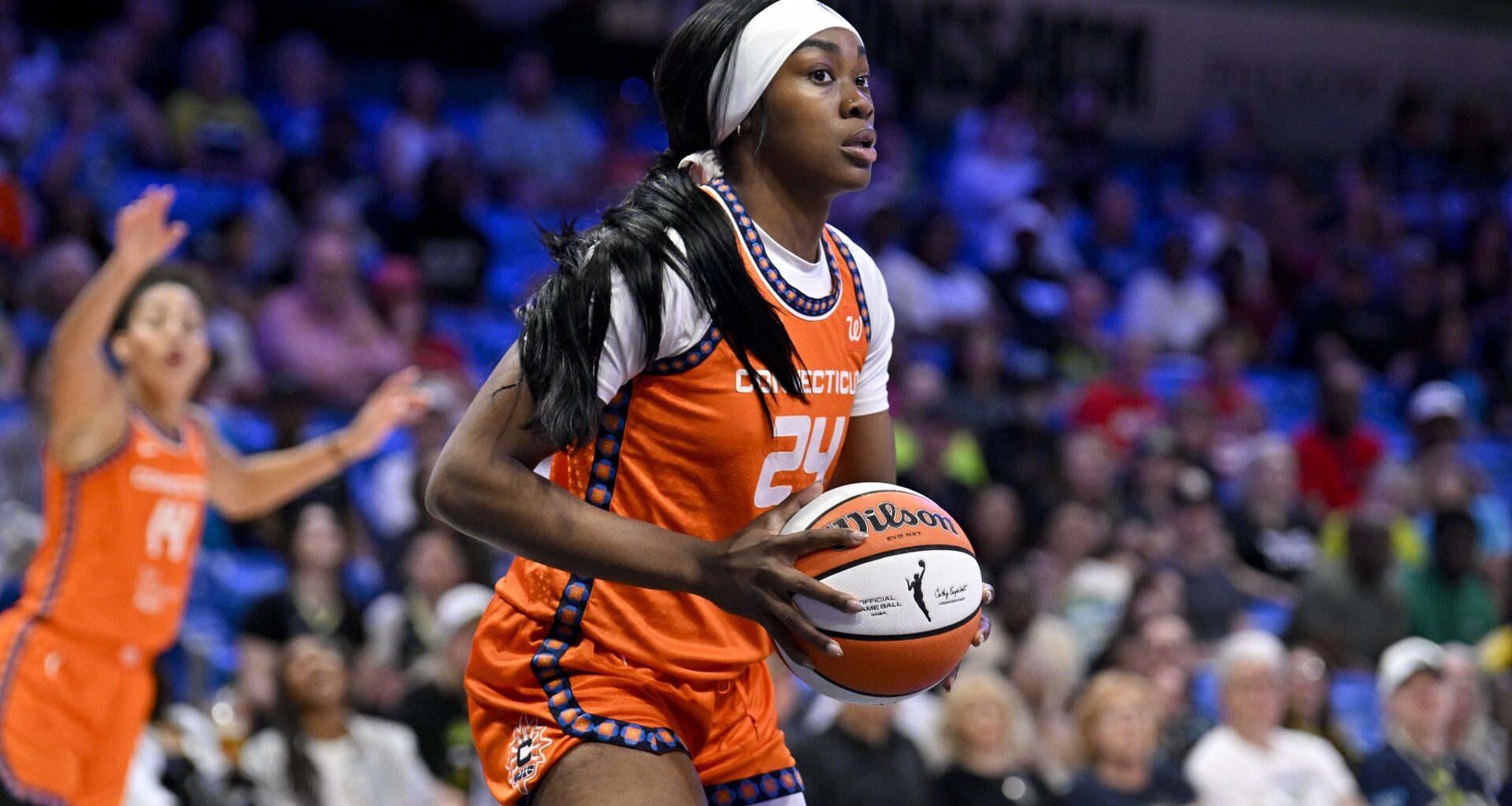 Aug 27, 2025; Arlington, Texas, USA; Connecticut Sun forward Aneesah Morrow (24) grabs a rebound against the Dallas Wings during the first half at College Park Center.