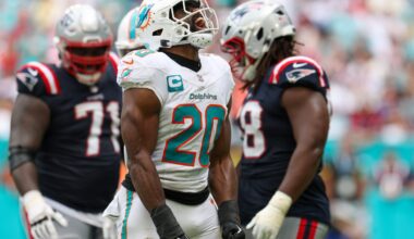 Sep 14, 2025; Miami Gardens, Florida, USA; Miami Dolphins linebacker Jordyn Brooks (20) reacts after play against the New England Patriots in the fourth quarter at Hard Rock Stadium.
