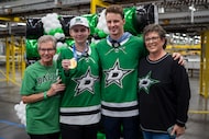Dallas Stars goalie Jake Oettinger (second from right) poses for a photo during a HopeKids...