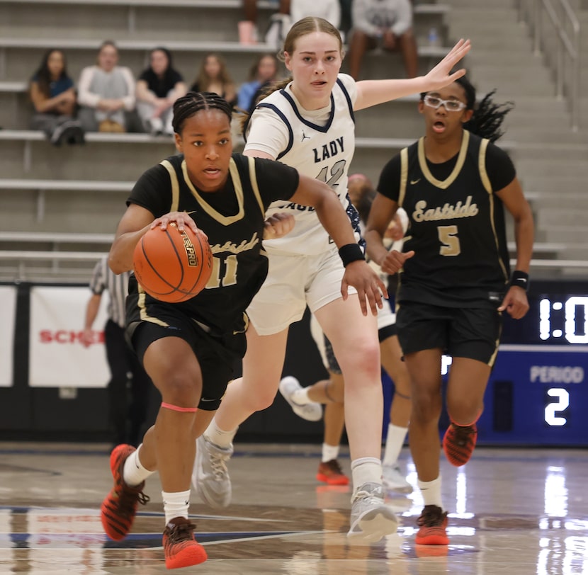 Plano East guard Arianna Robinson )11) sprints to the basket on a fast break as she is...