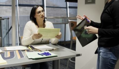 Amanda Valenzuela, a senior accounting major in the Woody L. Hunt College of Business at The University of Texas at El Paso, works on a tax return with a member of the local community as part of the Volunteer Income Tax Assistance (VITA) program on Feb. 20, 2026, at the GECU Terrace in the UTEP Sun Bowl. During the 2026 tax season, UTEP students have prepared 2,294 returns free of charge through Project VITA.