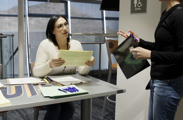 Amanda Valenzuela, a senior accounting major in the Woody L. Hunt College of Business at The University of Texas at El Paso, works on a tax return with a member of the local community as part of the Volunteer Income Tax Assistance (VITA) program on Feb. 20, 2026, at the GECU Terrace in the UTEP Sun Bowl. During the 2026 tax season, UTEP students have prepared 2,294 returns free of charge through Project VITA.