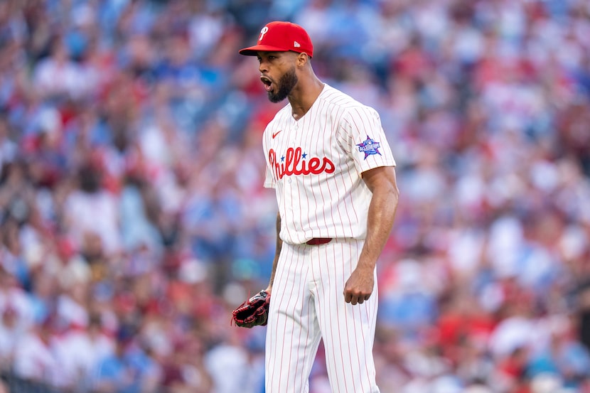 Philadelphia Phillies stating pitcher Cristopher Sanchez reacts to the final out of the top...