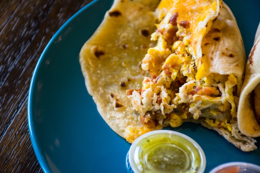 A flour tortilla filled with bacon, egg and cheese is but one of many variations of...