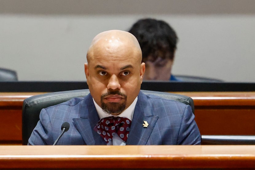 DART Board Chair Randall Bryant listens to a speaker during a DART board of directors...
