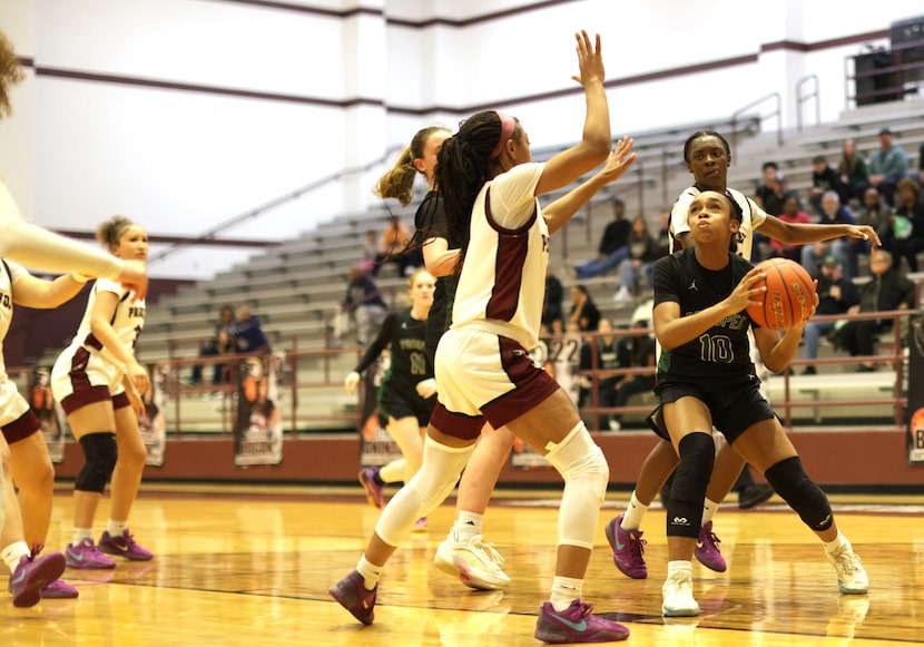 Prosper's Lauryn Williams (10) takes a shot during the Prosper High School at Princeton High...