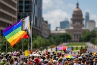 AUSTIN, TEXAS - APRIL 15: A Pride flag is seen held up in a crowd during preparation for a...