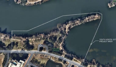 Overhead image of shore of Lady Bird Lake south shore near S. Lakeshore Blvd with Youth Hostel Site project area outlined
