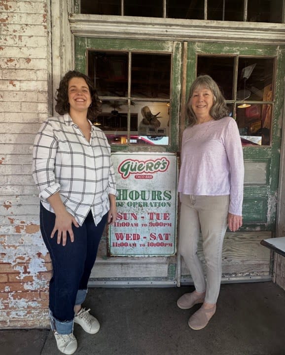 <em>Lyle and her mom Cathy pose outside Guero’s</em>