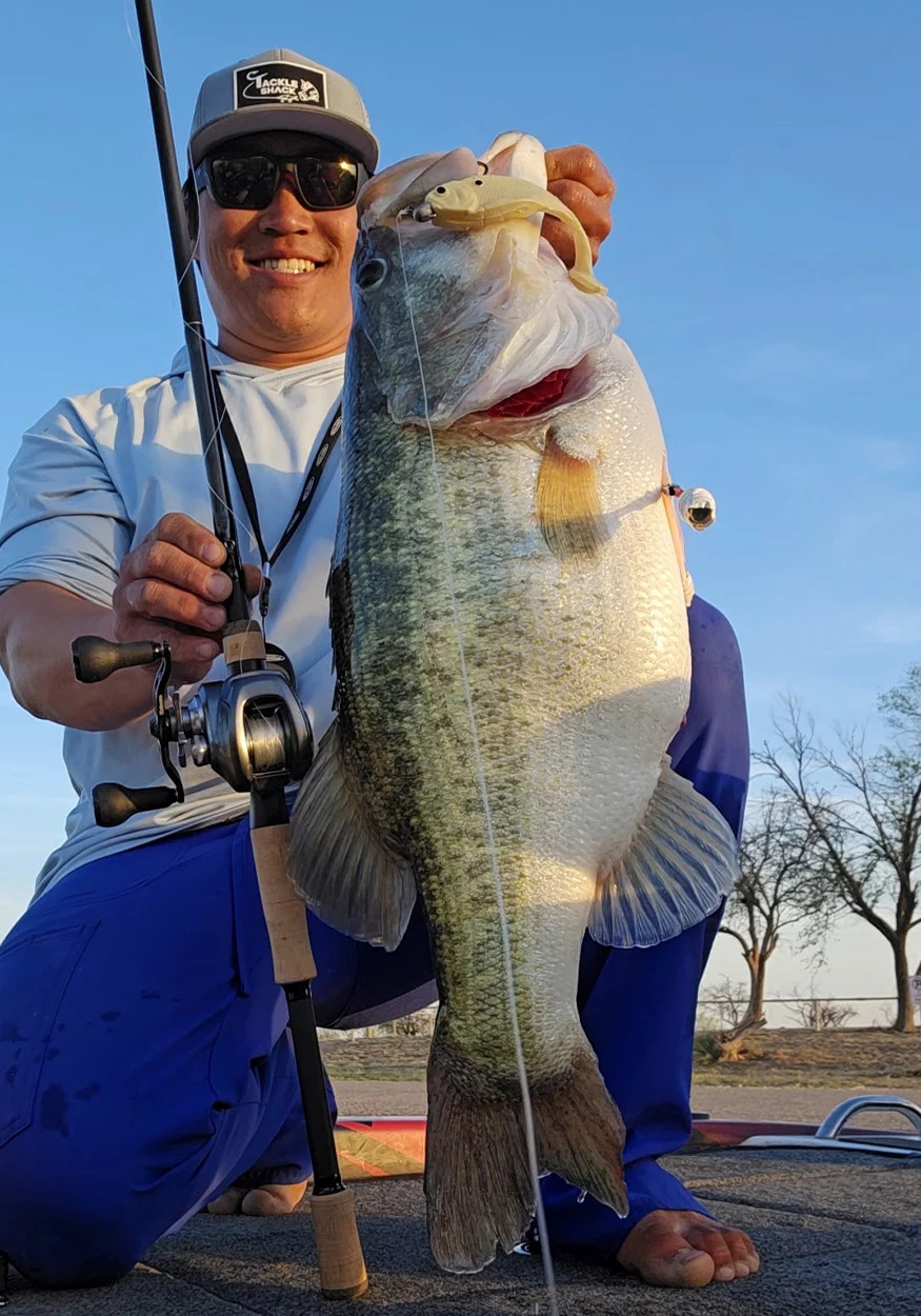 A bass guide with a huge Texas largemouth.