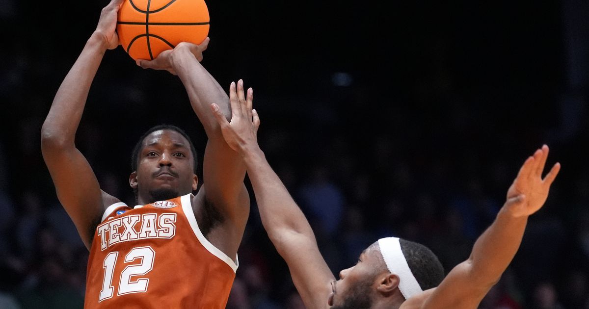 Tramon Mark's late jumper gives Texas a 68-66 win over NC State in the First Four :: WRAL.com