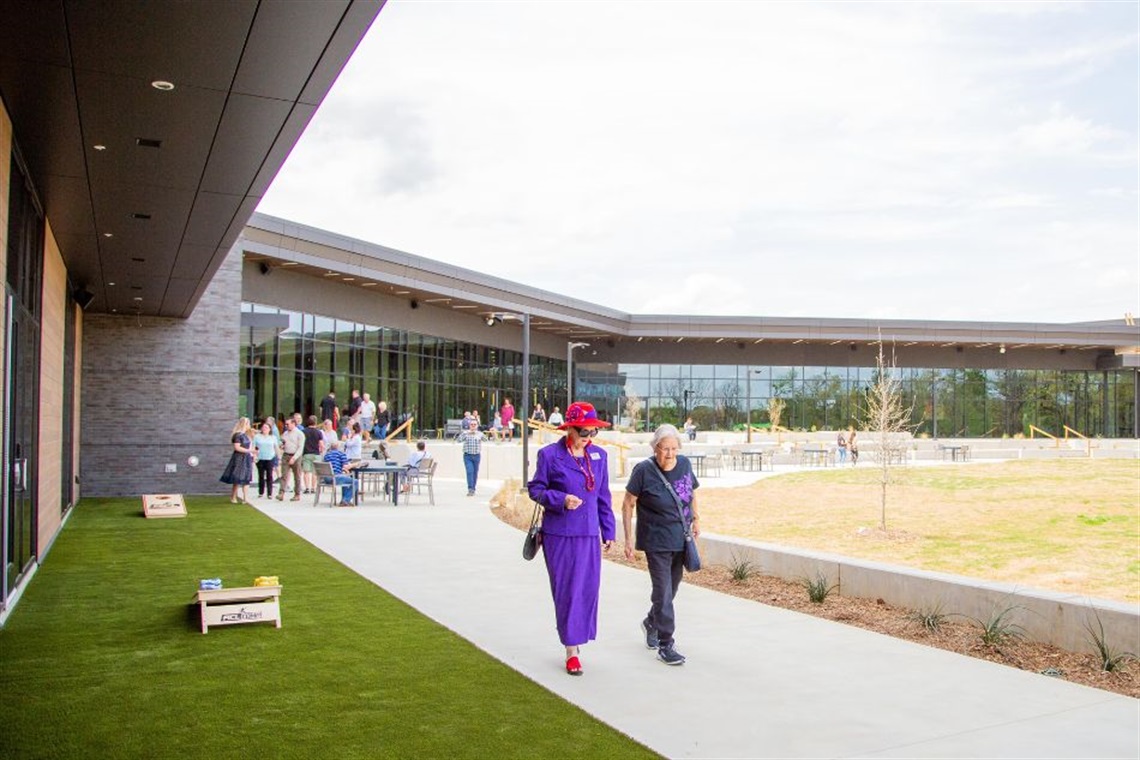Residents walking around the new ACTIV, which held its grand opening on March 26, 2025.