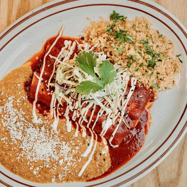 Wagyu beef enchiladas at Loma TXMX in Arlington, Texas.