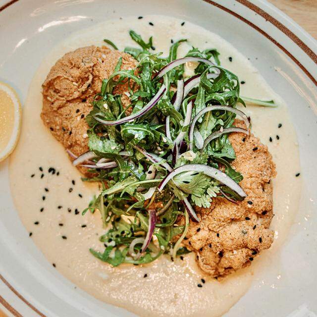 Chicken milanesa with elote velouté at Loma TXMX.