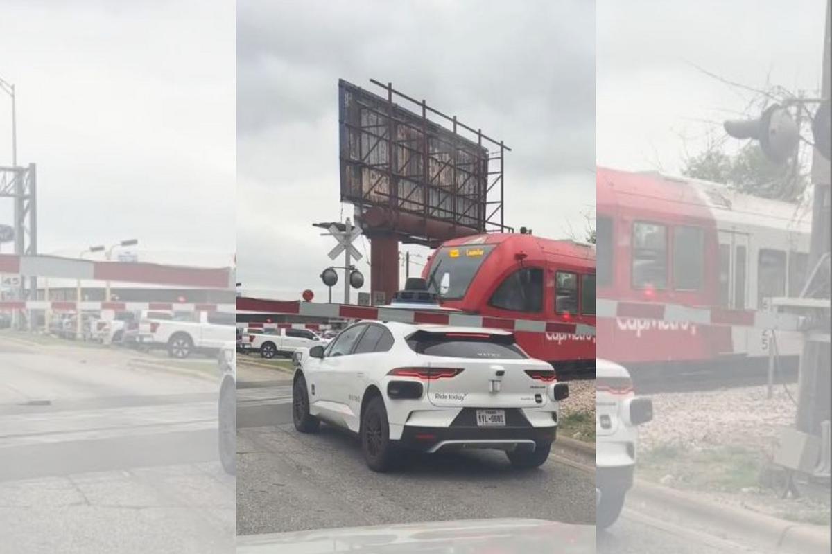 Waymo Driverless Car Stops Near Train Tracks in Austin