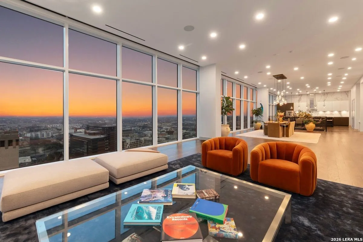 A 2-story San Antonio penthouse for sale has skyline views, a pool table and its own cinema