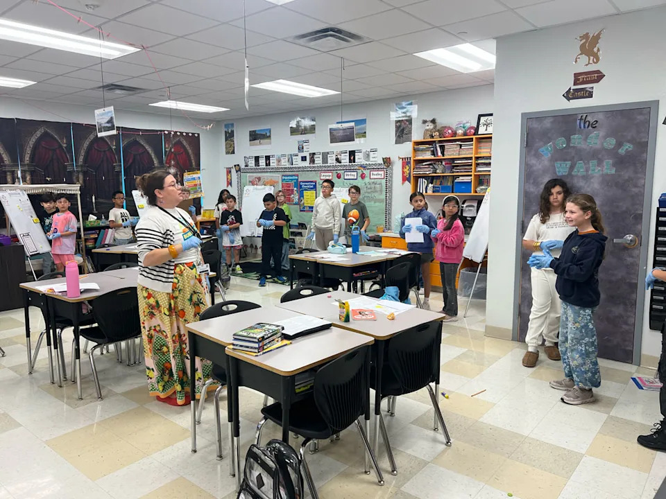 Hanna Patton-Elliott, a third grade teacher at Windsor Park Elementary, instructs her students to be doctors in a reading and writing exercise. (Lauren Wagner)
