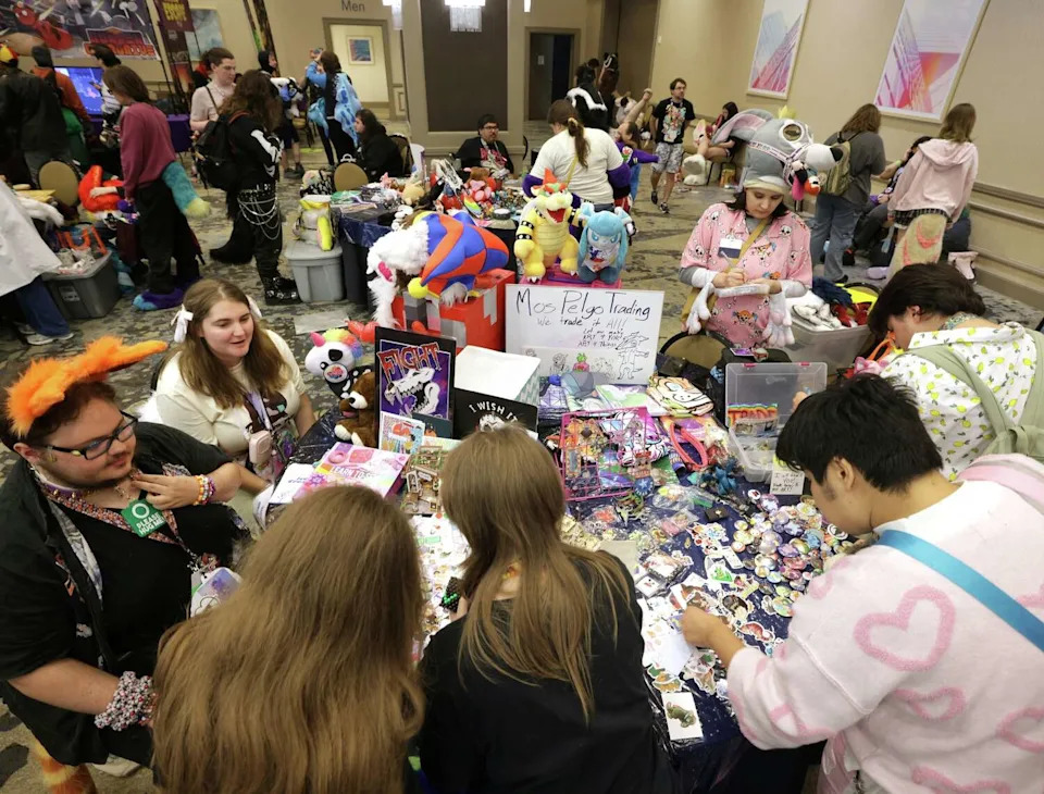 Attendees buy and trade furry-related items during the Furry Fiesta convention at the Sheraton Dallas Hotel in Dallas, Texas, on Mar 28, 2026. (Jason Janik/Special Contributor)