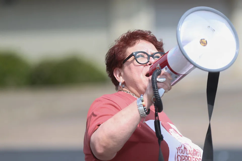Nancy Vera, president of the Corpus Christi American Federation of Teachers, rallies marchers at the 24th annual César Chávez Marcha down Agnes Street in Corpus Christi on March 29, 2025.