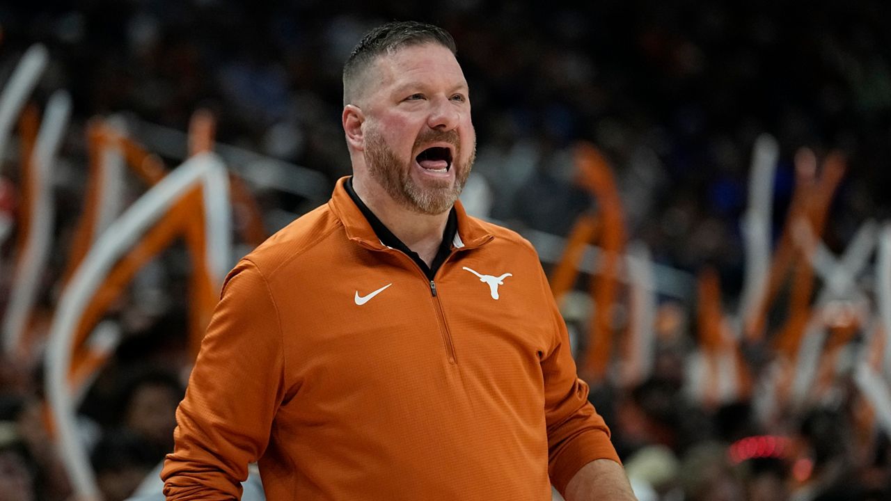 Texas head coach Chris Beard talks to his players during the first half of an NCAA college basketball game against Creighton in Austin, Texas, Thursday, Dec. 1, 2022. (AP Photo/Eric Gay)