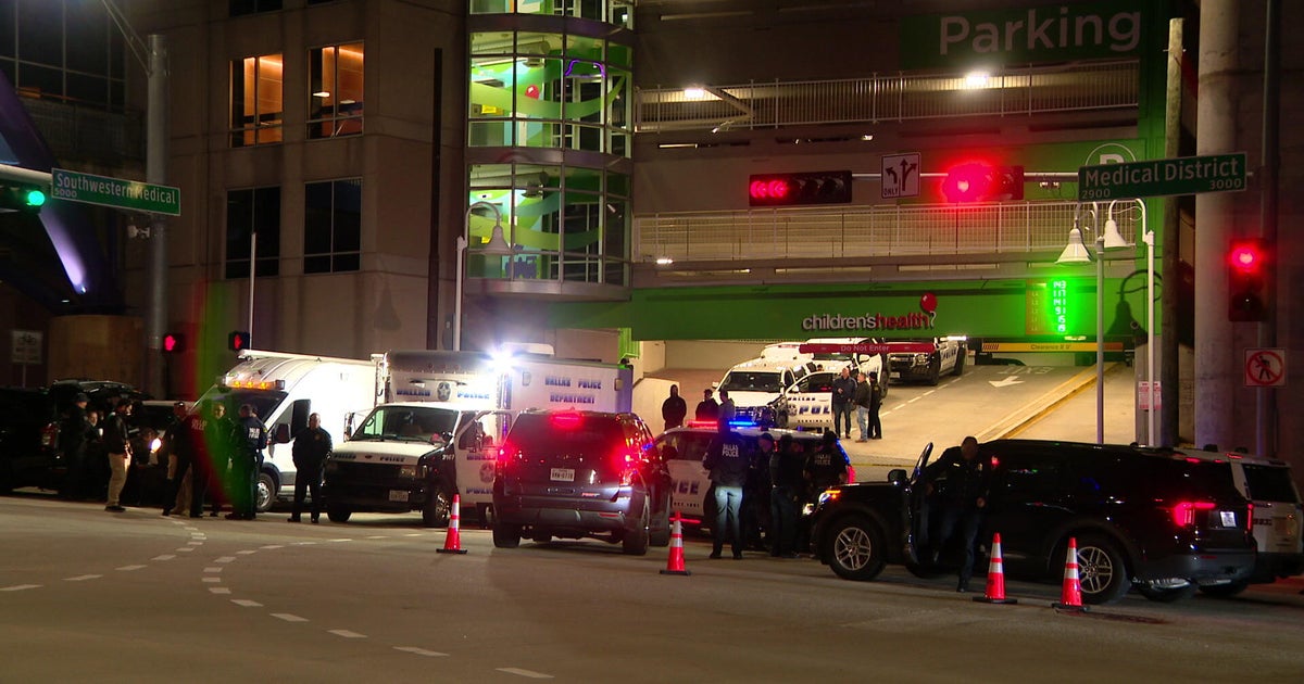 Dallas SWAT officers shoot, kill fugitive who pointed a gun at them in a hospital parking garage