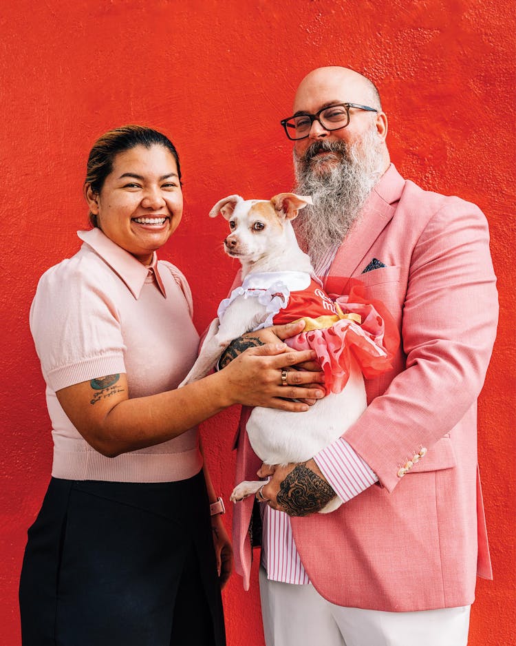 photo of two people with dog
