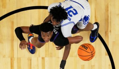 TCU forward Xavier Edmonds and Duke center Patrick Ngongba II battle for a rebound during the first half of a second-round NCAA college basketball tournament game Saturday, March 21, 2026, in Greenville, S.C. (AP Photo/Chris Carlson)