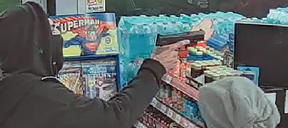 A security camera image shows an unidentified masked man pointing a handgun during an armed robbery of the Circle K store, 10567 Rushing Road, next to Veterans Park in Northeast El Paso on Feb. 8, 2026.