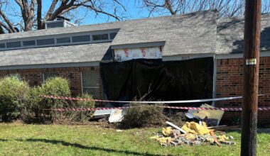 Driver arrested after car crashes into house, Arlington police say