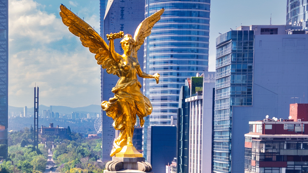 A picture of the golden Angel of Independence monument in Mexico City.