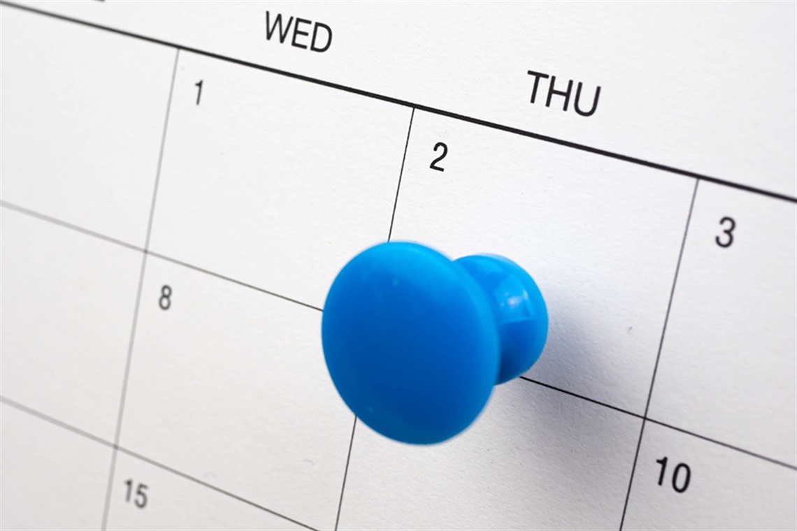 Calendar with a blue pin on Thursday the 2nd