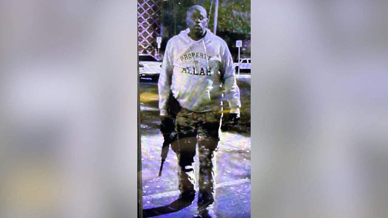 Austin shooting suspect wearing hoodie referencing Allah and carrying rifle