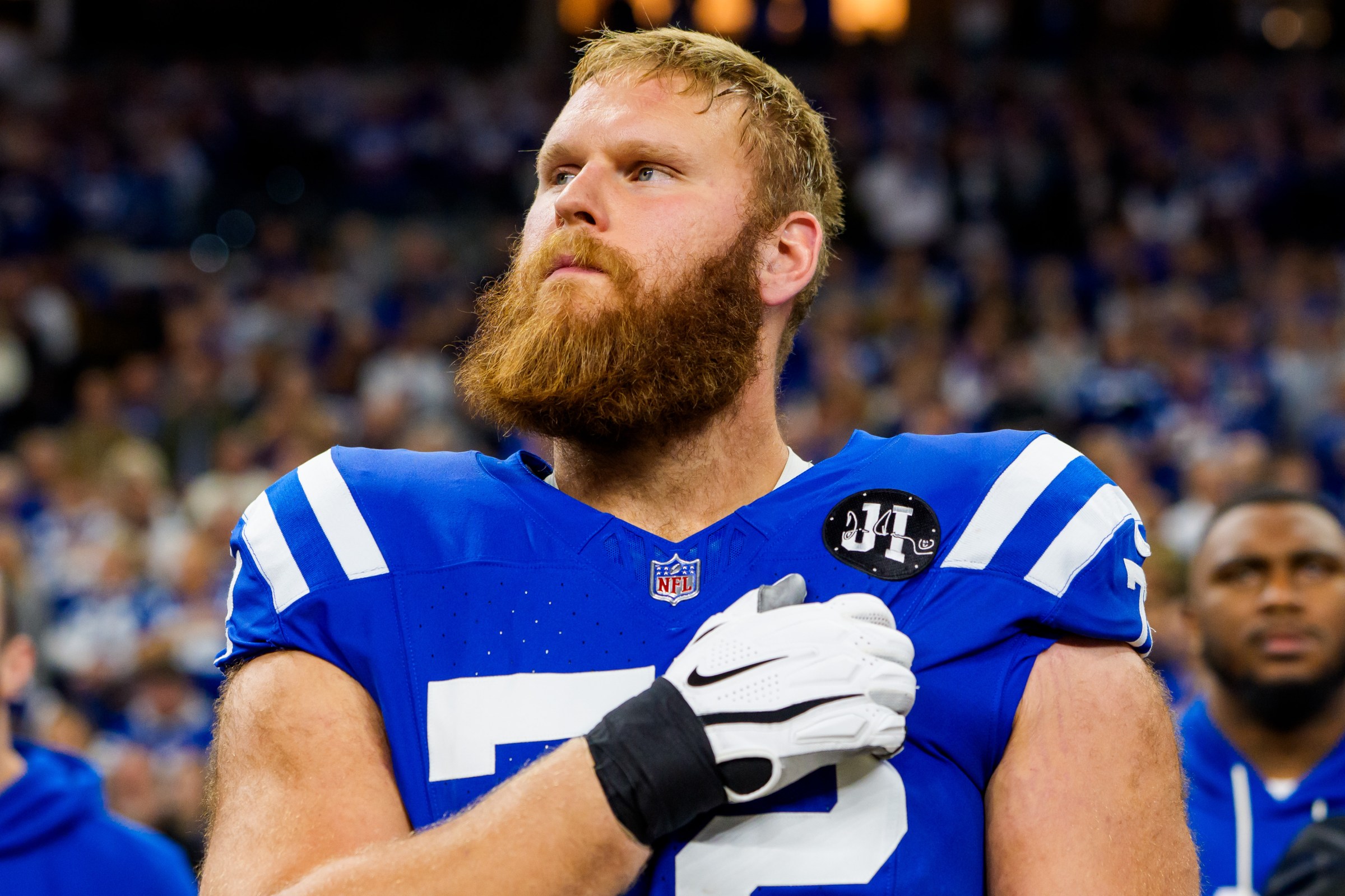 INDIANAPOLIS, INDIANA - NOVEMBER 30: Braden Smith #72 of the Indianapolis Colts holds hand over heart during National Anthem prior to an NFL football game against the Houston Texans at Lucas Oil Stadium on November 30, 2025 in Indianapolis, Indiana. (Photo by Todd Rosenberg/Getty Images)
